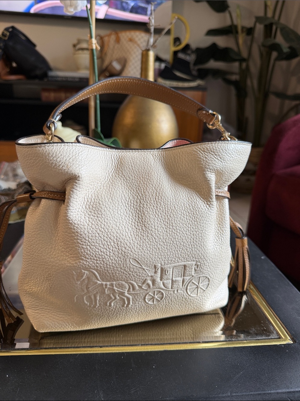 Cream Leather Drawstring Top Handle coach Bag with Embossed Carriage